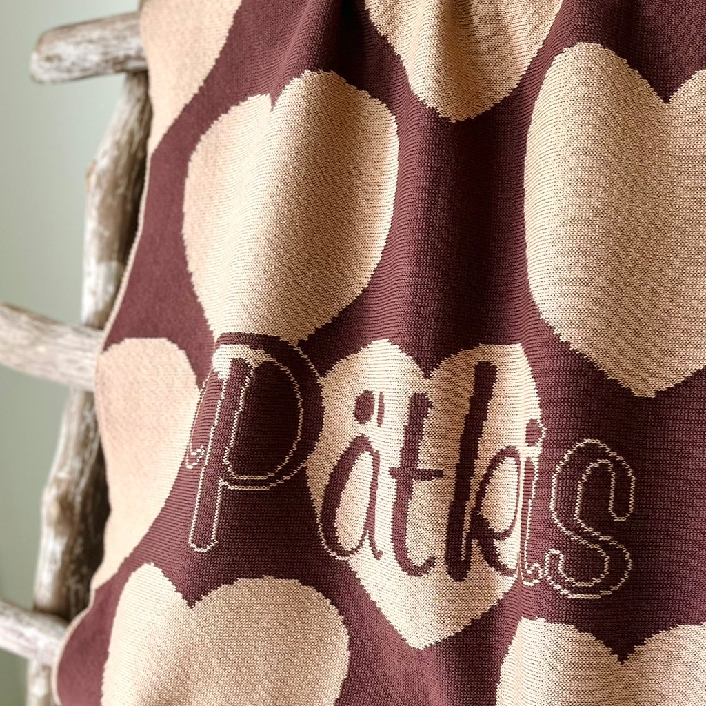 Personalized knitted blanket with hearts