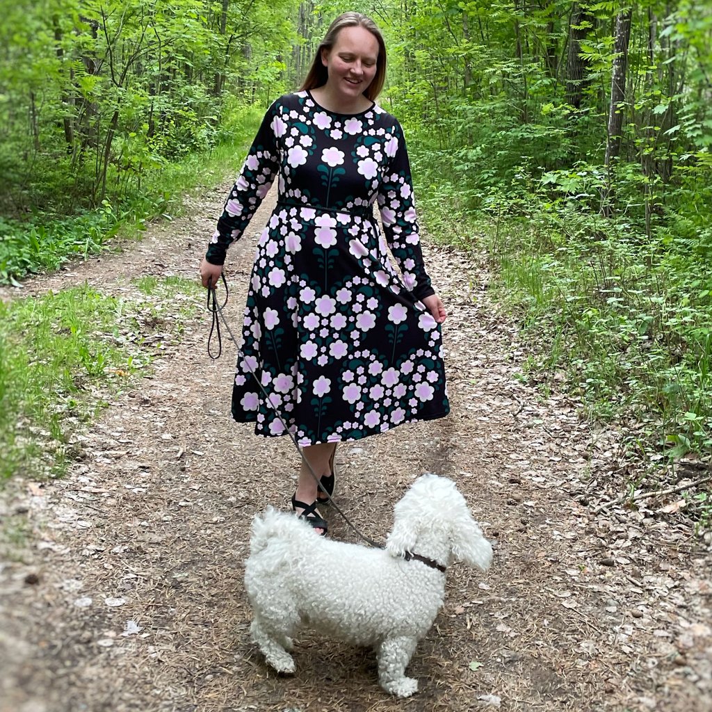 Designer Sari Ahokainen and her dog Panda. Sari is wearing a midi dress by SHALMIAK.